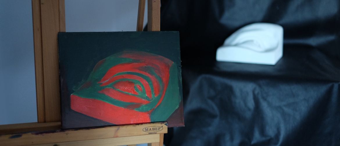 Still life under single-source light with coloured shadows, in the studio beside its setup.